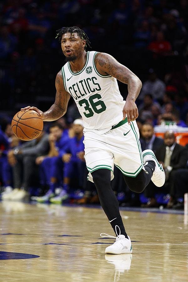 Boston Celtics' Marcus Smart in action during the second half of an NBA basketball game against the Philadelphia 76ers, Wednesday, Oct. 23, 2019, in Philadelphia.  (AP Photo/Chris Szagola)