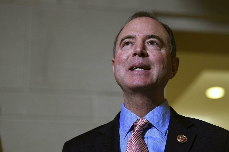 House Intelligence Committee Chairman Adam Schiff, D-Calif., talks with reporters on Capitol Hill in Washington, Wednesday, Nov. 6, 2019, about the House impeachment inquiry. (AP Photo/Susan Walsh)