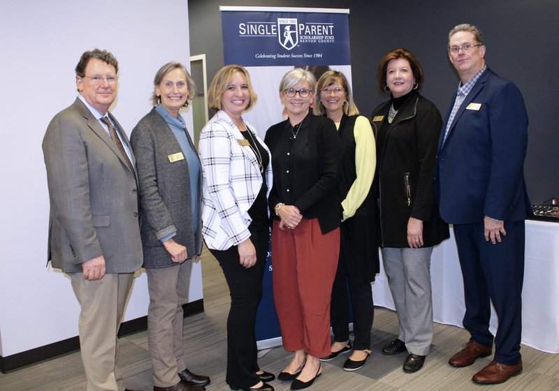 NWA Democrat-Gazette/CARIN SCHOPPMEYER Denton and Cathy Seilhan (from left), Twyla Rownak, Wendy Soderquist Togami, Sandie Ford, Karen Parker and Jack Eaton, Single Parent Scholarship Fund executive director, help launch the Marjorie Marugg-Wolfe Sustainability Campaign on Oct. 29 at Hunt Tower in Rogers.