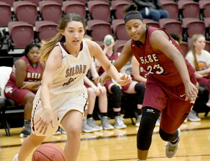 Bud Sullins/Special to Siloam Sunday Senior guard Alexsis Fortner drives the baseline against Beebe during a game last season. Fortner is one of seven seniors on this year's squad, which opens its season on Monday against West Fork in the Duel at the Dome tournament in West Fork.