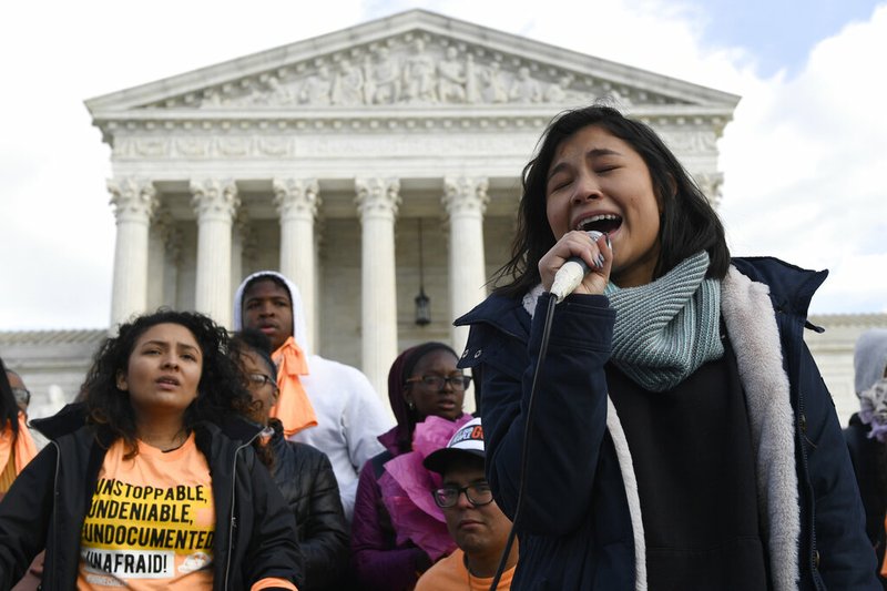 Michelle Lainez, 17, originally from El Salvador but now living in Gaithersburg, Md., speaks during a rally outside the Supreme Court in Washington, Friday, Nov. 8, 2019. 