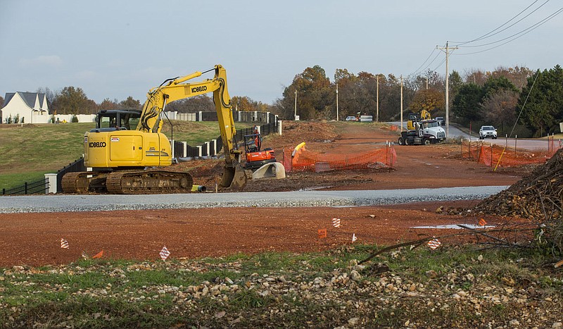 Construction progresses on the West Pleasant Grove Road extension in Rogers in this Thursday, Nov. 7, 2019, file photo.