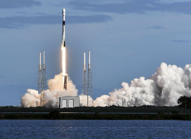 A SpaceX Falcon 9 rocket lifts off Monday from Cape Canaveral, Fla., on a mission to launch the mini satellites. 