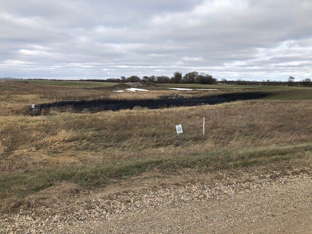 This Wednesday, Oct. 30, 2019 photo provided by the North Dakota Department of Environmental Quality shows affected land from a Keystone oil pipeline leak near Edinburg, North Dakota. Regulators said TC Energy's Keystone pipeline leaked an estimated 383,000 gallons of oil in northeastern North Dakota, though the cause was still under investigation. (North Dakota Department of Environmental Quality/Taylor DeVries)