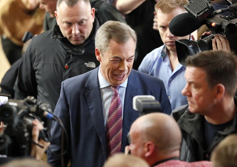 Brexit party leader Nigel Farage speaks to journalists during an event as part of the General Election campaign trail, in Hartlepool, England, Monday, Nov. 11, 2019. Britain goes to the polls on Dec. 12. (AP Photo/Frank Augstein)