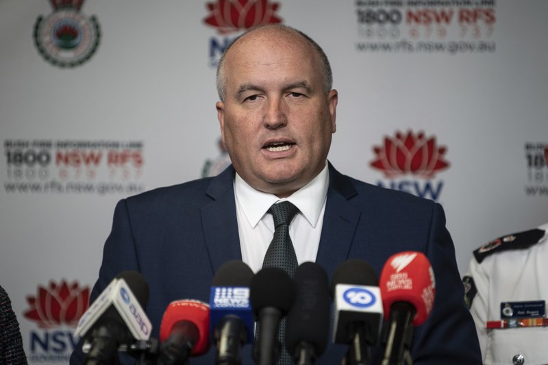 In this Oct. 9, 2019, photo, New South Wales (NSW) state Emergency Services Minister David Elliott speaks during a press conference at the NSW Rural Fire Service Headquarters at Sydney Olympic Park in Sydney. Australia&#x2019;s most populous state declared a state of emergency on Monday, Nov. 11, 2019, due to unprecedented wildfire danger as calls grew for Australia to take more action to plan for an counter climate change. Elliott said residents were facing what &quot;could be the most dangerous bushfire week this nation has ever seen.&#x201d; (James Gourley/AAP Images via AP)