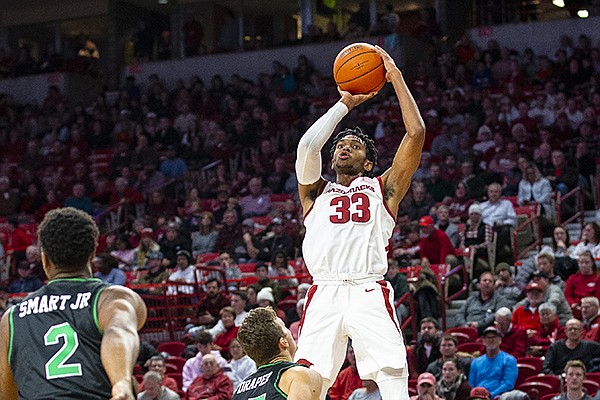 Arkansas guard Jimmy Whitt shoots a shot during a game against North Texas on Tuesday, Nov. 12, 2019, in Fayetteville. 