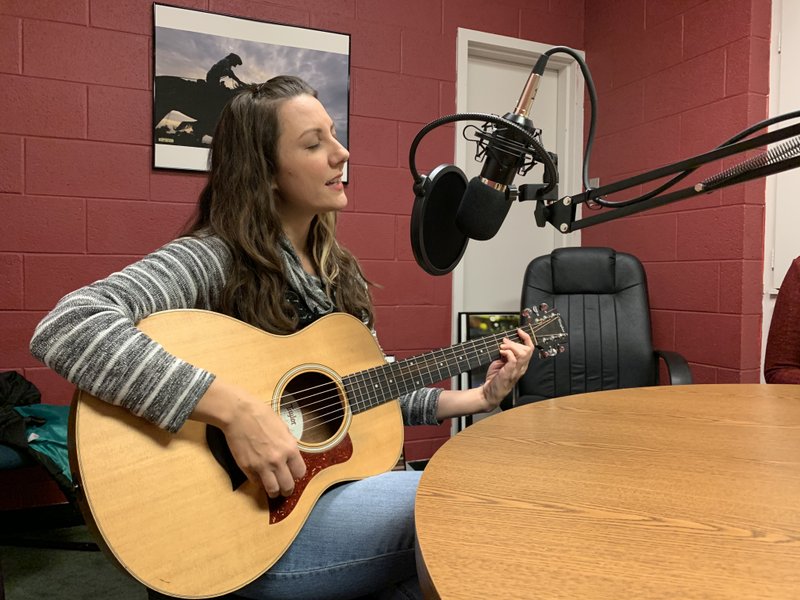 Fayetteville singer/songrwiter and multi-instrumentalist Candy Lee performs during the What's Up! podcast with associated editor Jocelyn Murphy.