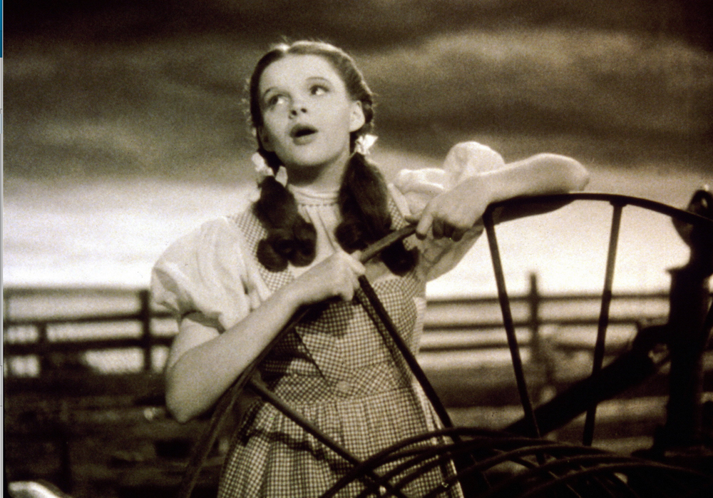 Singer-actress Judy Garland, as Dorothy Gale, sings "Somewhere Over the Rainbow," in a scene from the classic 1939 film "The Wizard of Oz," in this undated promotional photo. (AP)