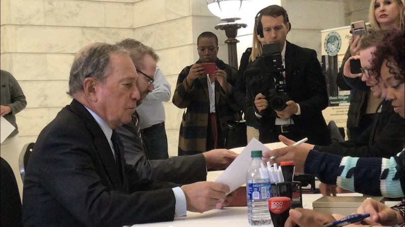 Former New York City mayor Mike Bloomberg files to run for president on Tuesday at the state Capitol.