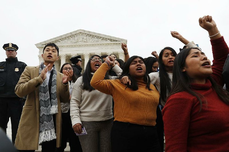 Recipients of the Deferred Action for Childhood Arrivals program leave the Supreme Court building after oral arguments were heard Tuesday on a challenge to the Trump administration’s efforts to end the program. More photos at arkansasonline.com/1113court/ 