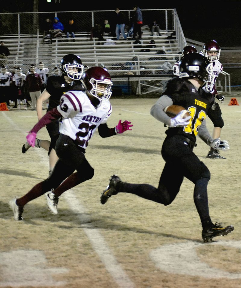 MARK HUMPHREY ENTERPRISE-LEADER Prairie Grove freshman halfback Ethan Miller, shown busting loose for a 22-yard gain against Gentry Oct. 31, 2019, has the ability to break off a long run on any given play. Miller had a 59-yard carry to set up a touchdown and a 29-yard touchdown run during a 22-0 win by the junior Tigers at Elkins on Oct. 24.