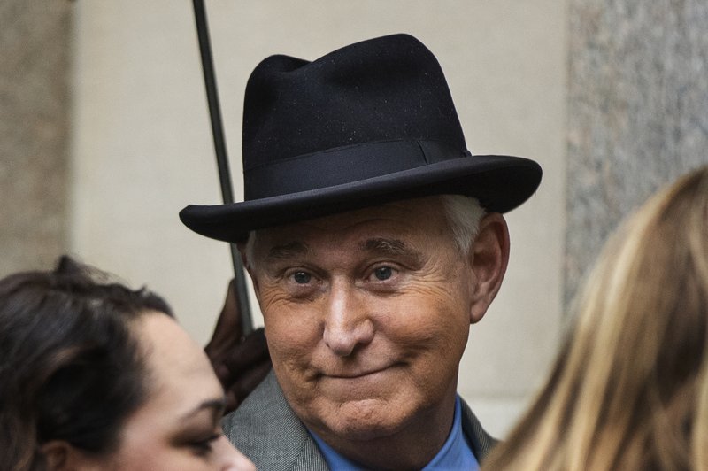 Roger Stone, a longtime Republican provocateur and former confidant of President Donald Trump, waits in line at the federal court in Washington, Tuesday, Nov. 12, 2019. (AP Photo/Manuel Balce Ceneta)