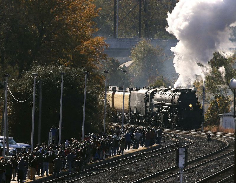 Arkansas Democrat-Gazette/THOMAS METTHE -- 11/13/2019 --
A crowd watches from the ramp as the Union Pacific Big Boy steam locomotive No. 4014 pulls into Union Station in Little Rock on Wednesday, Nov. 13, 2019. The locomotive will be on display Thursday from 9am-3pm at the Union Pacific rail yard in North Little Rock. 
See more photos at www.arkansasonline.com/1114bigboy/