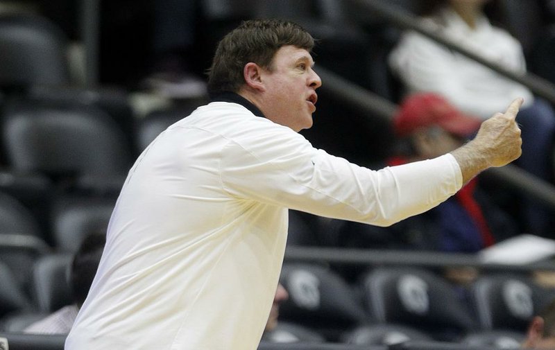 UALR head coach Joe Foley yells to his players during the fourth quarter of UALR's 65-50 loss on Wednesday, Nov. 13, 2019, at the Jack Stephens Center in Little Rock. 