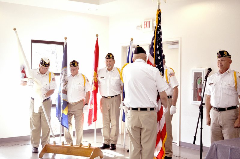 RACHEL DICKERSON/MCDONALD COUNTY PRESS The American Legion Post 392 Honor Guard posts the colors during a Veterans Day ceremony on Sunday, Nov. 10, 2019, at the Pineville Community Center.