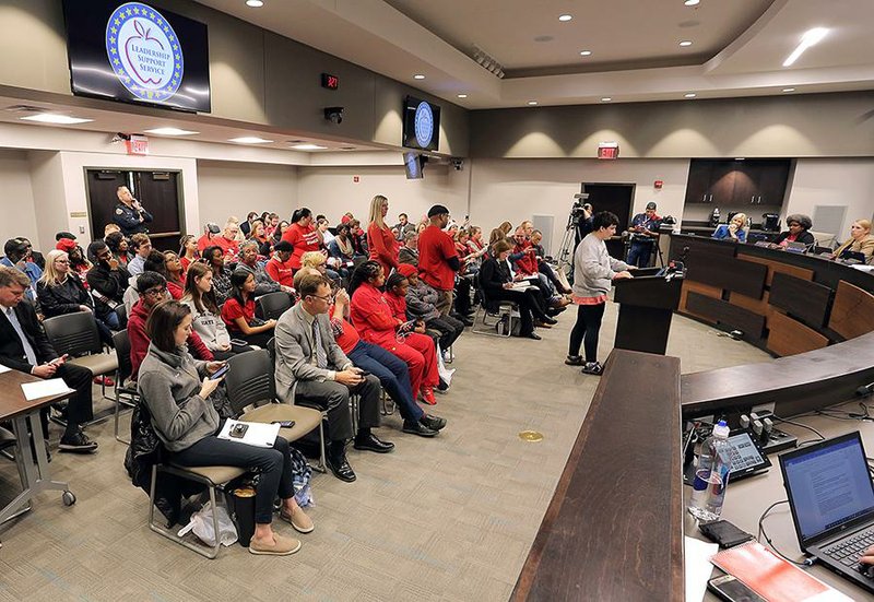 Arkansas Democrat-Gazette/JOHN SYKES JR. - 111419 -  Striking teachers and concerned parents sit during the comment period at the Arkansas State Board of Education meeting Thursday afternoon in Little Rock, on a day when Little Rock teachers went out on strike. See more photos at arkansasonline.com/1115edboard/