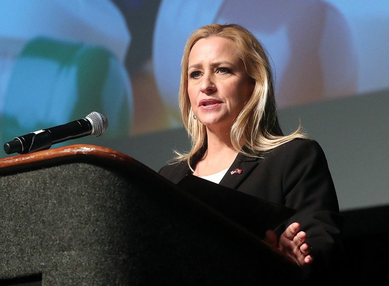 Arkansas Attorney General Leslie Rutledge welcomes attendees to the Prescription Drug Abuse Prevention Summit 2019 at the Hot Springs Convention Center Thursday morning. 