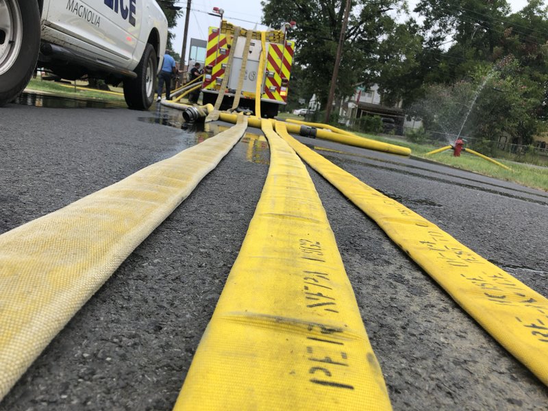 This 2018 Banner-News file photo shows the Magnolia Fire Department and other emergency agencies in action during a fire. A vehicle collision and ensuing blaze severely burned a man Thursday in Magnolia, according to the department. 