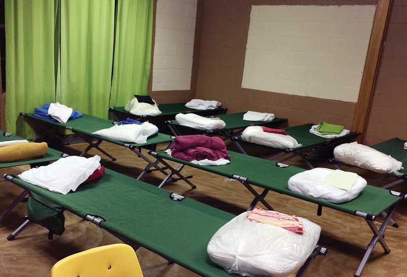 Cots are shown at the Conway Ministry Center warming station, 701 Polk St. Although the center doesn’t officially open until Dec. 15, it has already been open two nights on an emergency basis. The facility has about 40 cots, and 20 more are needed, said Spring Hunter, executive director of the Conway Ministry Center.