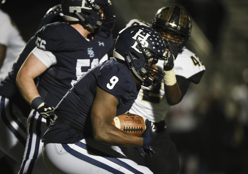 NWA Democrat-Gazette/CHARLIE KAIJO Har-Ber tailback Torrance Farmer (9) carries the ball, Friday, November 15, 2019 during a Class 7A playoff football game at Springdale Har-Ber High School in Springdale.