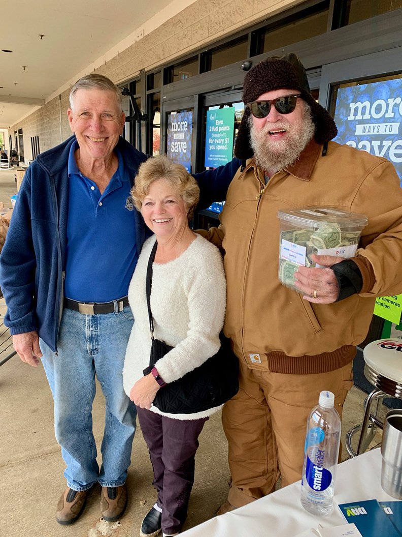 Braving the cold weather on Nov. 8, Glenn and Mary Ellen Laursen stopped by the James L. Whitby Chapter 5 Disabled American Veterans Outreach station at Kroger on Central to converse with the Chapter Commander Benny Arego. Mary Ellen, a United States Daughters of 1812 member, presented Arego with a star from a retired flag thanking him for his service in the U.S. Army. Her husband, Glenn, was a U.S. Air Force B-52 pilot during the Vietnam War. For more information on DAV Chapter 5 activities visit https://spikehsv8.wixsite.com/dav5. - Submitted photo