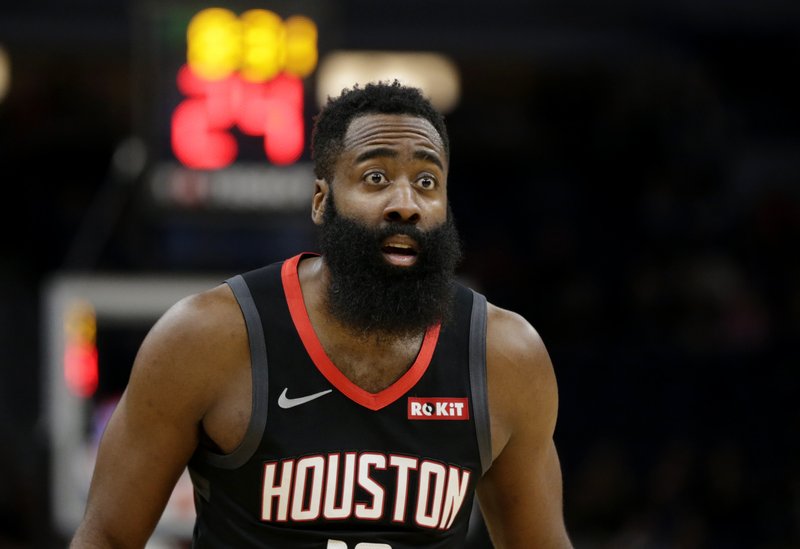 Houston Rockets guard James Harden looks at an official in the first quarter of Saturday's game against the Minnesota Timberwolves in Minneapolis. - Photo by Andy Clayton- King of The Associated Press