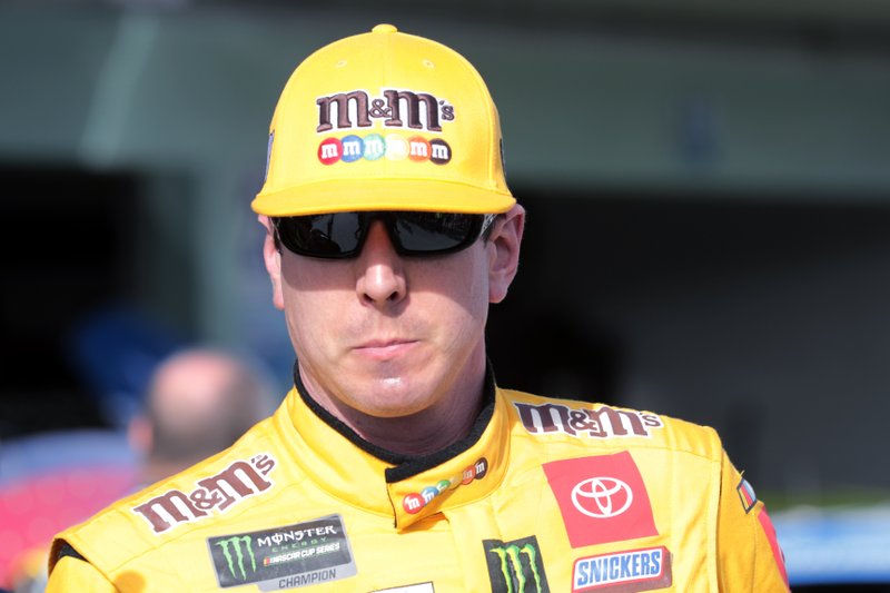 Kyle Busch leaves the garage Saturday after a NASCAR Cup Series race practice at Homestead-Miami Speedway in Homestead, Fla. - Photo by Luis M. Alvarez of The Associated Press