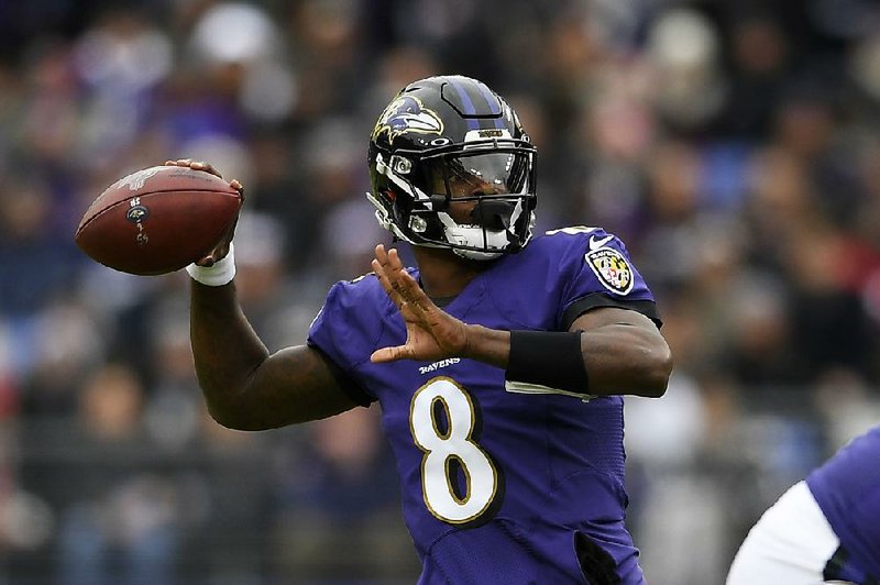 Baltimore quarterback Lamar Jackson threw four touchdown passes to key the Ravens’ 41-7 rout of the Houston Texans on Sunday in Baltimore.