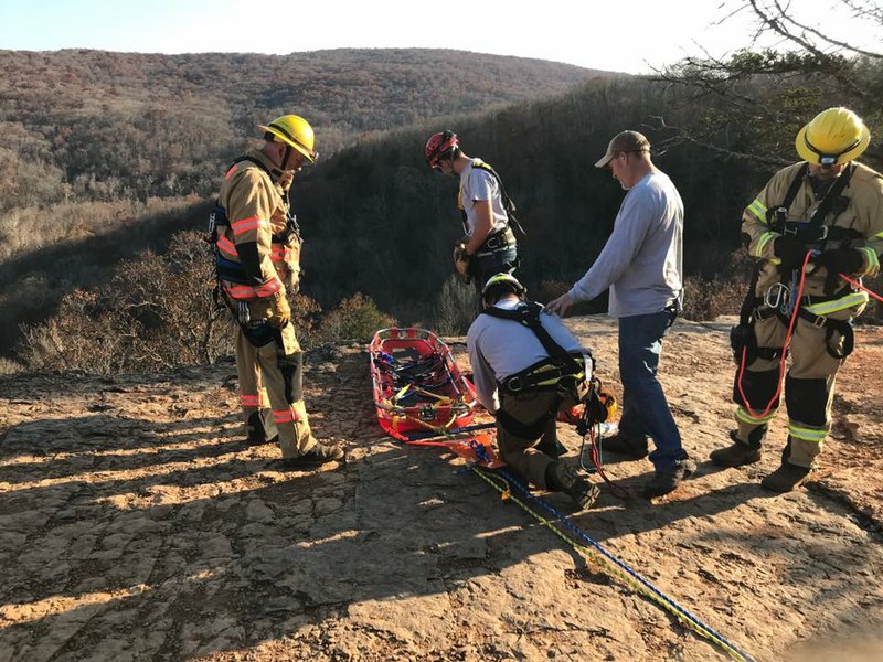 PHOTO COURTESY WASHINGTON COUNTY
Washington County Office of Emergency Management USAR Team run a rescue mission at the Yellow Rock Bluff Overlook in Devil's Den State Park. 