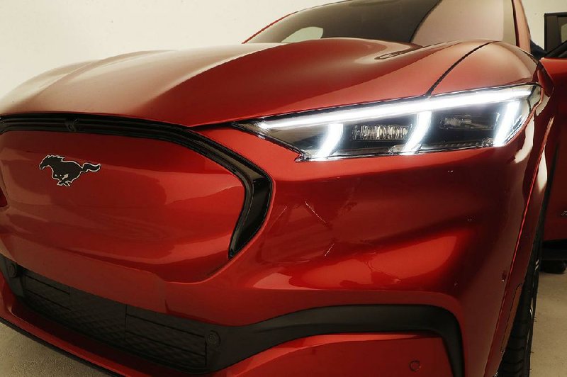 Ford Motor Co. on Sunday unveiled the new Mustang Mach-E, one of 40 electric and hybrid models the company wants to introduce by 2022.