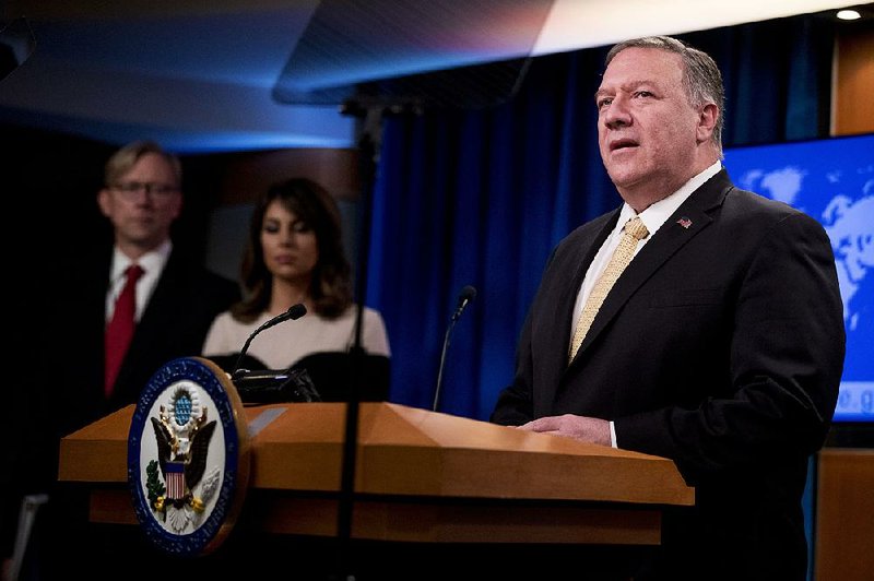 “Calling the establishment of civilian settlements inconsistent with international law has not advanced the cause of peace,” Secretary of State Mike Pompeo said Monday of U.S. policy on Israel’s West Bank settlements. He was joined at his news conference by Brian Hook (left), the U.S.’ special representative on Iran, and by department spokeswoman Morgan Ortagus. More photos are avail- able at arkansasonline.com/1119pompeo/. 