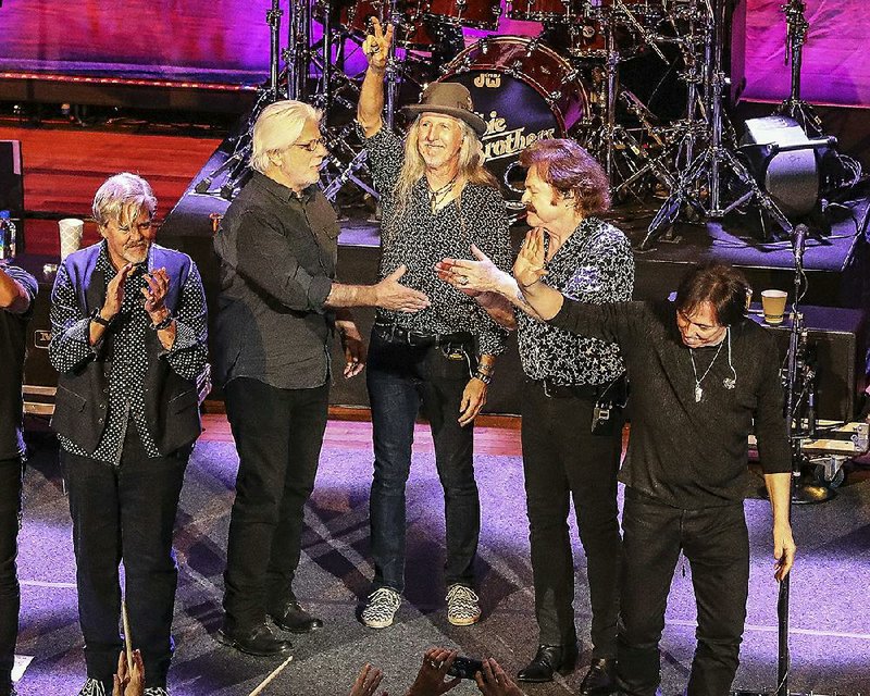 Michael McDonald (second from left) appears with members of the Doobie Brothers on Monday at the Ryman Auditorium in Nashville, Tenn. 