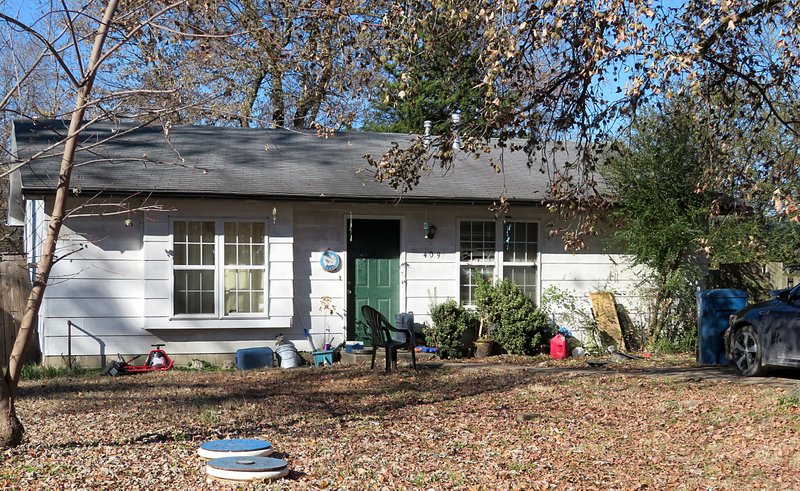 According to Gentry police, shotgun blasts were fired into the front of this home at 409 S. Giles Ave. in Gentry shortly before 8:30 p.m. on Monday, Nov. 18, 2019. Pellet marks could be seen on the front door, and a window, to the south of the front door, was also broken out on Tuesday morning.