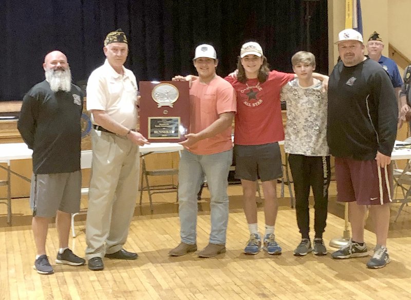 Photo submitted Members of the Siloam Springs American Legion Post 29 baseball team presented Post 29 with the American Legion Baseball state runner-up trophy the team won this past summer. Pictured are coach Tony Coffey (left), Post 29 commander Stuart Reeves, J.P. Wills, Elijah Coffey, Chase Mills and Alan Hardcastle.