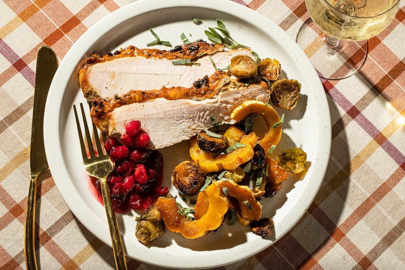 For the Washington Post/JUSTIN TSUCALAS Herbed Turkey Breast With Delicata Squash and Brussels Sprouts