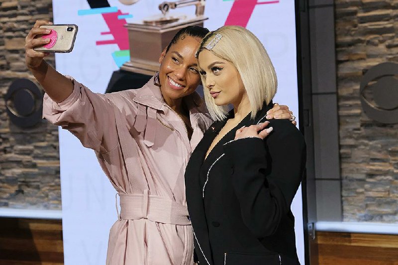 Alicia Keys (left) and Bebe Rexha participate in the 62nd Grammy Awards nominations news conference Wednesday at the CBS Broadcast Center in New York. 