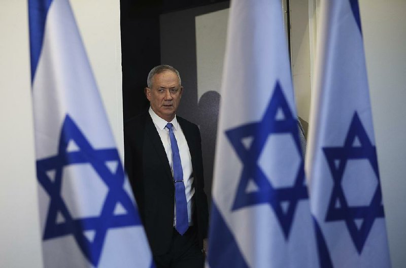 Benny Gantz arrives for a news conference Wednesday in Tel Aviv after he was unable to form a governing coalition.