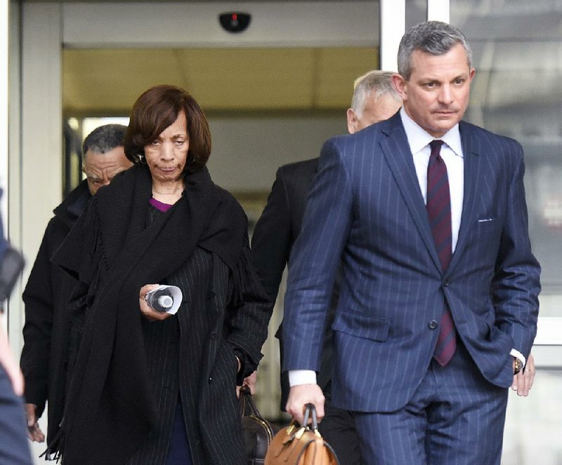 Former Baltimore Mayor Catherine Pugh leaves U.S. District Court in Baltimore with her attorney Steven Silverman on Thursday. 