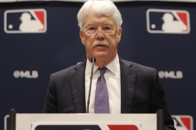 New Kansas City Royals owner John Sherman makes a brief statement to reporters after a baseball owners meeting in Arlington, Texas, Thursday, Nov. 21, 2019. (AP Photo/LM Otero)