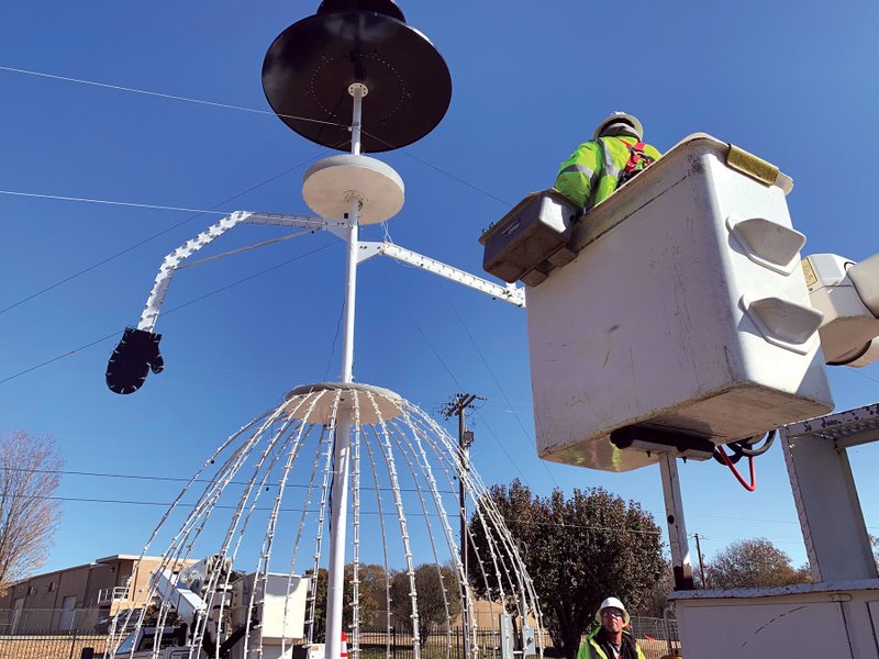 Batesville city landscape/cemetery employee Josh Melton works on the 40-foot snowman, a staple at the White River Wonderland, located in the city’s Riverside Park. Lights will be turned on the day before Thanksgiving, and the last night they will be on is Jan. 1.