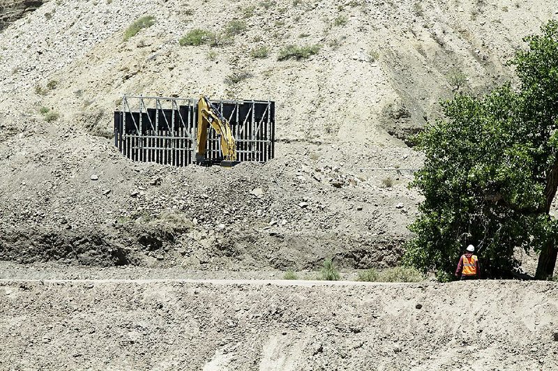A section of fencing is moved into place in May in a border wall project in Sunland Park, N.M., completed by We Build the Wall. U.S. Customs and Border Protection officials have appeared hesitant to endorse that effort, but El Paso Border Patrol sector chief Gloria Chavez openly praised it earlier this month. 