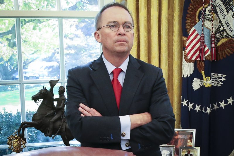 Acting White House chief of staff Mick Mulvaney listens as President Donald Trump speaks during a meeting with Turkish President Recep Tayyip Erdogan in the Oval Office on Nov. 13. MUST CREDIT: Photo for The Washington Post by Oliver Contreras