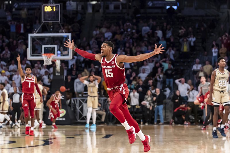 Arkansas junior guard Mason Jones celebrates after hitting the game-winning three-pointer in overtime against Georgia Tech at McCamish Pavilion in Atlanta. Jones led all scorers with 24 points as the Hogs improved to 6-0.