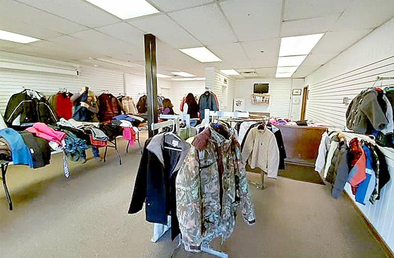 Photo submitted The former pro shop at the Bella Vista Country Club was transformed into a free coat store for two days earlier this month, thanks to the POA's Community Involvement Committee.