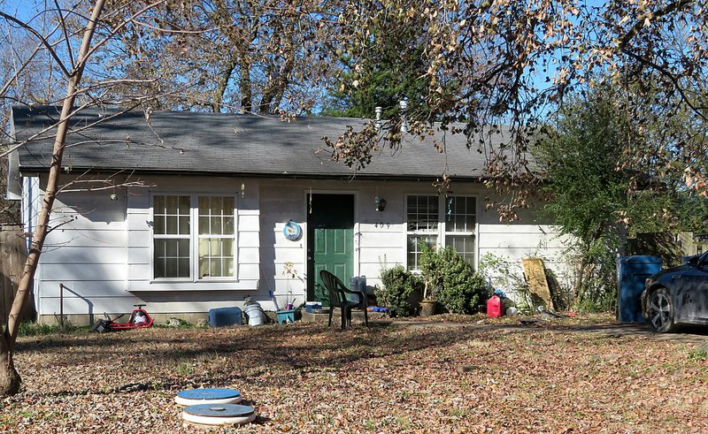 Westside Eagle Observer/RANDY MOLL According to Gentry police, four shotgun blasts were fired into the front of this home at 409 S. Giles Ave. in Gentry shortly before 8:30 p.m. on Monday, Nov. 18, 2019.