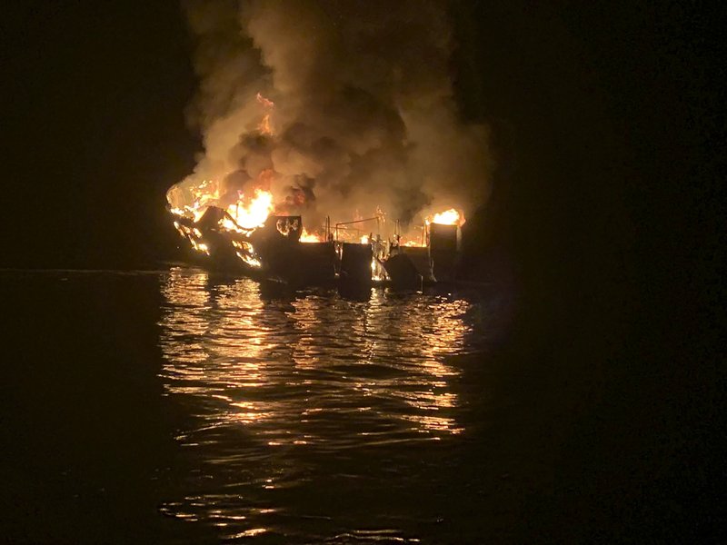  In this Sept. 2, 2019 file photo provided by the Santa Barbara County Fire Department, a dive boat is engulfed in flames off the Southern California Coast. Records show the diving boat that caught fire off California, killing 34 people, was among hundreds of small vessels exempted by the Coast Guard from stricter safety rules designed to make it easier for passengers to escape. (Santa Barbara County Fire Department via AP,File)