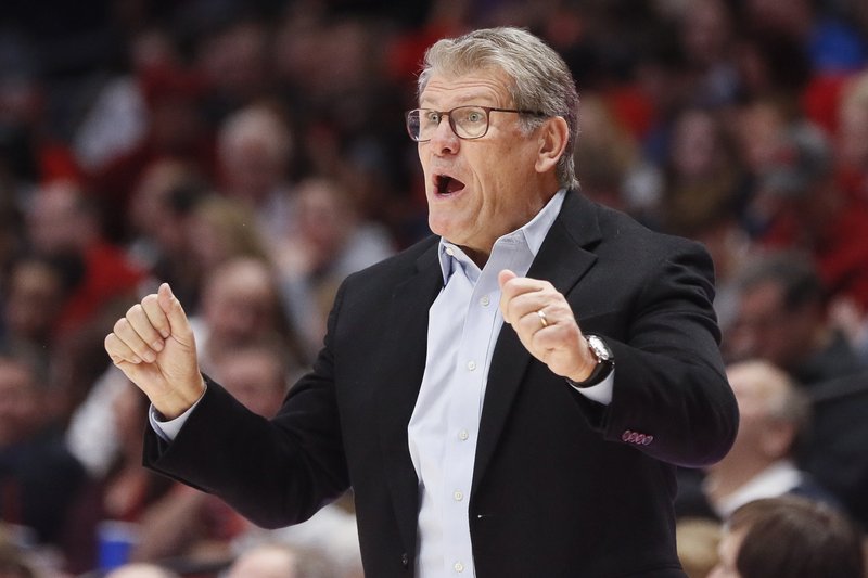 UConn head coach Geno Auriemma directs his players from the bench during the second half of an NCAA college basketball game against Dayton, Tuesday, Nov. 26, 2019, in Dayton, Ohio. (AP Photo/John Minchillo)