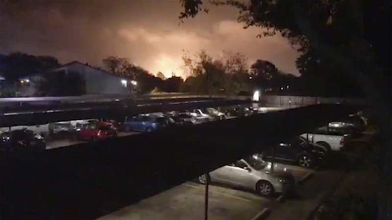 Smoke and fire fill the sky from a massive explosion at a Texas chemical plant on Wednesday, Nov. 27, 2019 in Port Neches, Texas. The fire continued to burn Wednesday morning at the TPC Group plant, after the blast sent a large plume of smoke that stretched for miles. All employees have been accounted for, TPC said in confirming that there were injuries. (KFDM-TV via AP)


