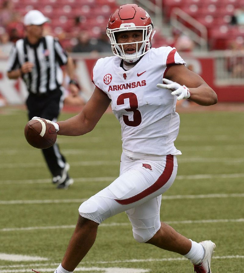 Wide receiver Koilan Jackson (above) is one of 12 Arkansas players carrying on a family tradition of playing football for the Razorbacks. Some current players are the second, third, fourth or fifth member of their family to play sports at the university. 